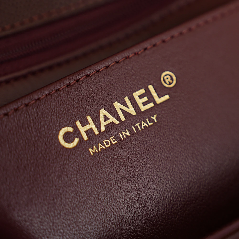Close-up of Chanel "MADE IN ITALY" stamp on Bordeaux of 26C Jennie’s New Chanel Bag AP5248 Preppy Coco Chanel vintage shoulder bag