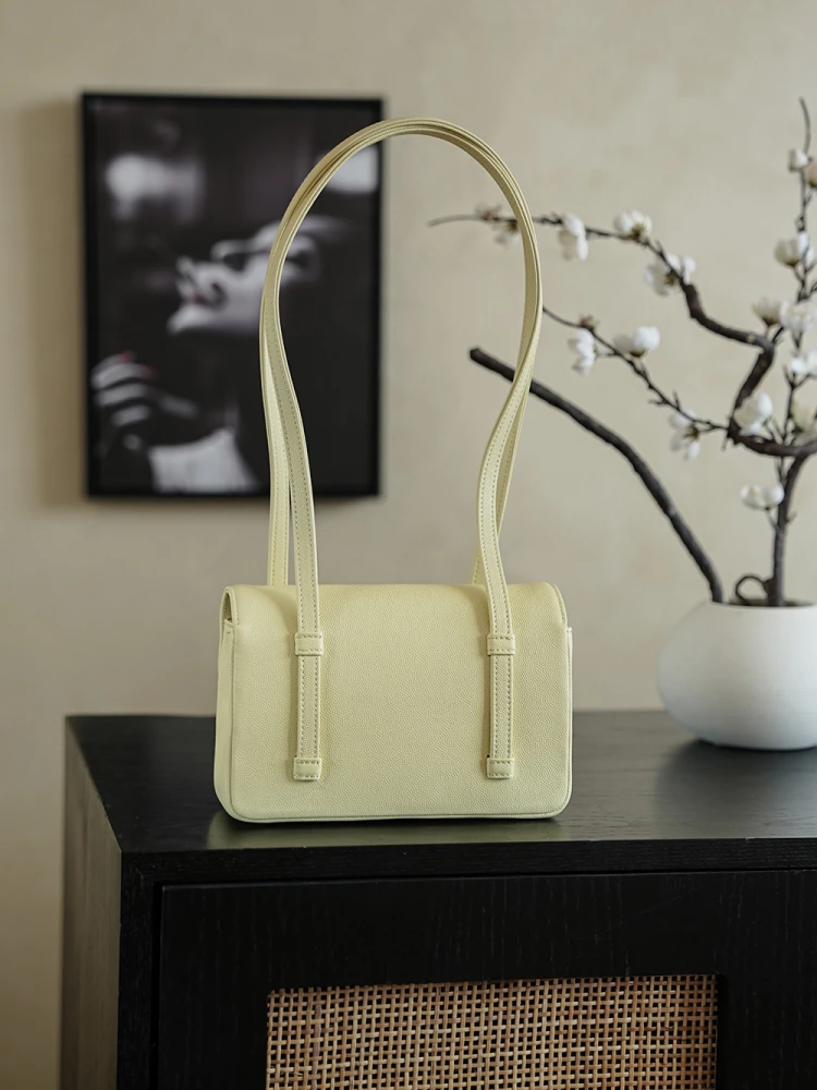 Back view of pale yellow 26C Jennie’s New Chanel Bag AP5248 Preppy Coco Chanel vintage shoulder bag with double C logo