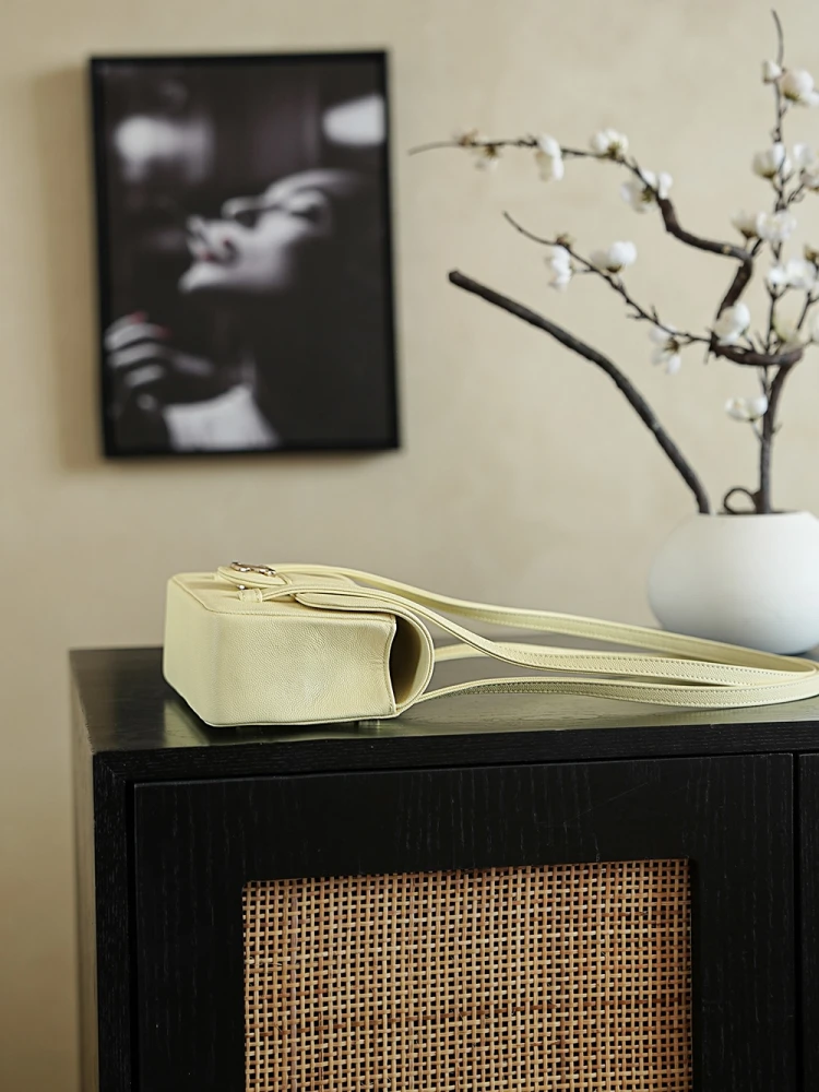 Side view of pale yellow 26C Jennie’s New Chanel Bag AP5248 Preppy Coco Chanel vintage shoulder bag 