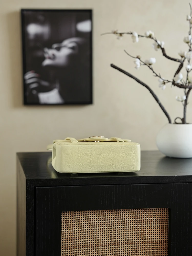 Bottom view of pale yellow 26C Jennie’s New Chanel Bag AP5248 Preppy Coco Chanel vintage shoulder bag