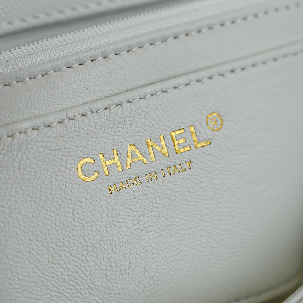 Close-up of Chanel "MADE IN ITALY" stamp on white of Jennie’s New Chanel Bag 26C AP5248 Preppy Coco Chanel vintage shoulder bag