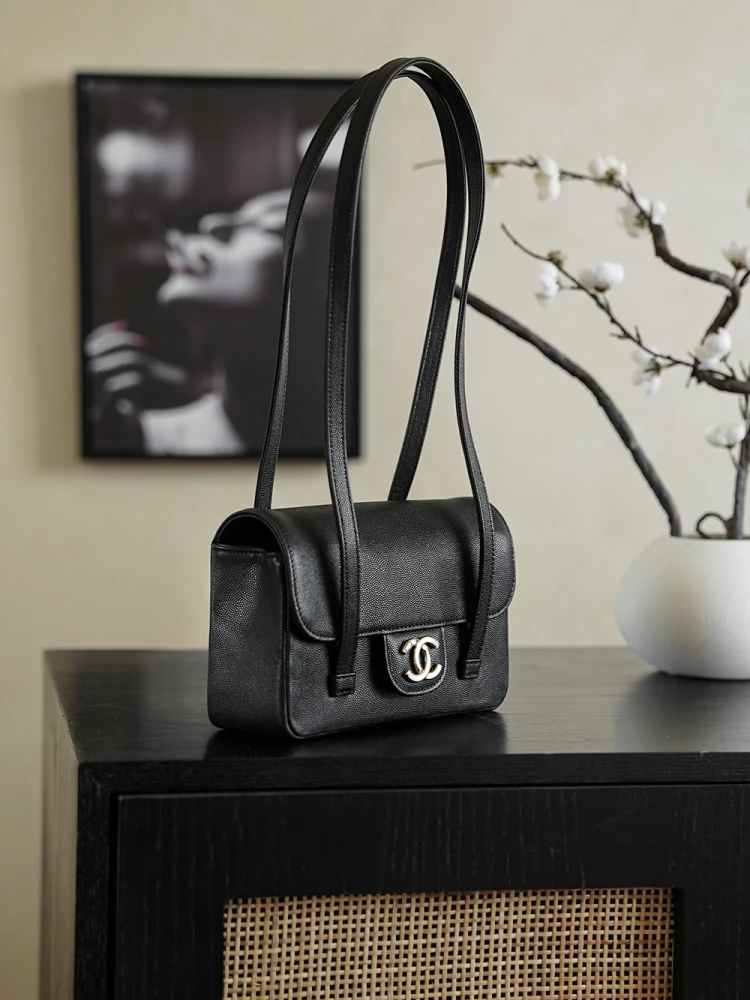 Front Left view of Chanel 26C AP5248 Jennie’s New Preppy Coco Chanel vintage shoulder bag in black with double C logo