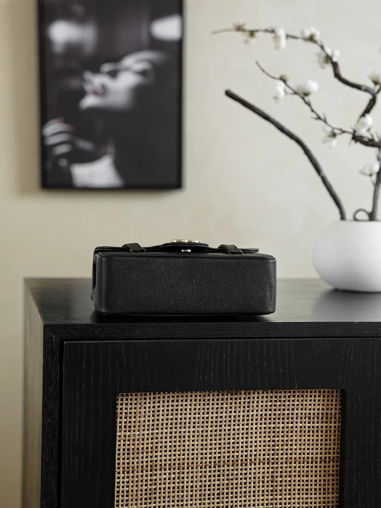 Bottom view of Chanel 26C AP5248 Jennie’s New Preppy Coco Chanel vintage shoulder bag in black with double C logo